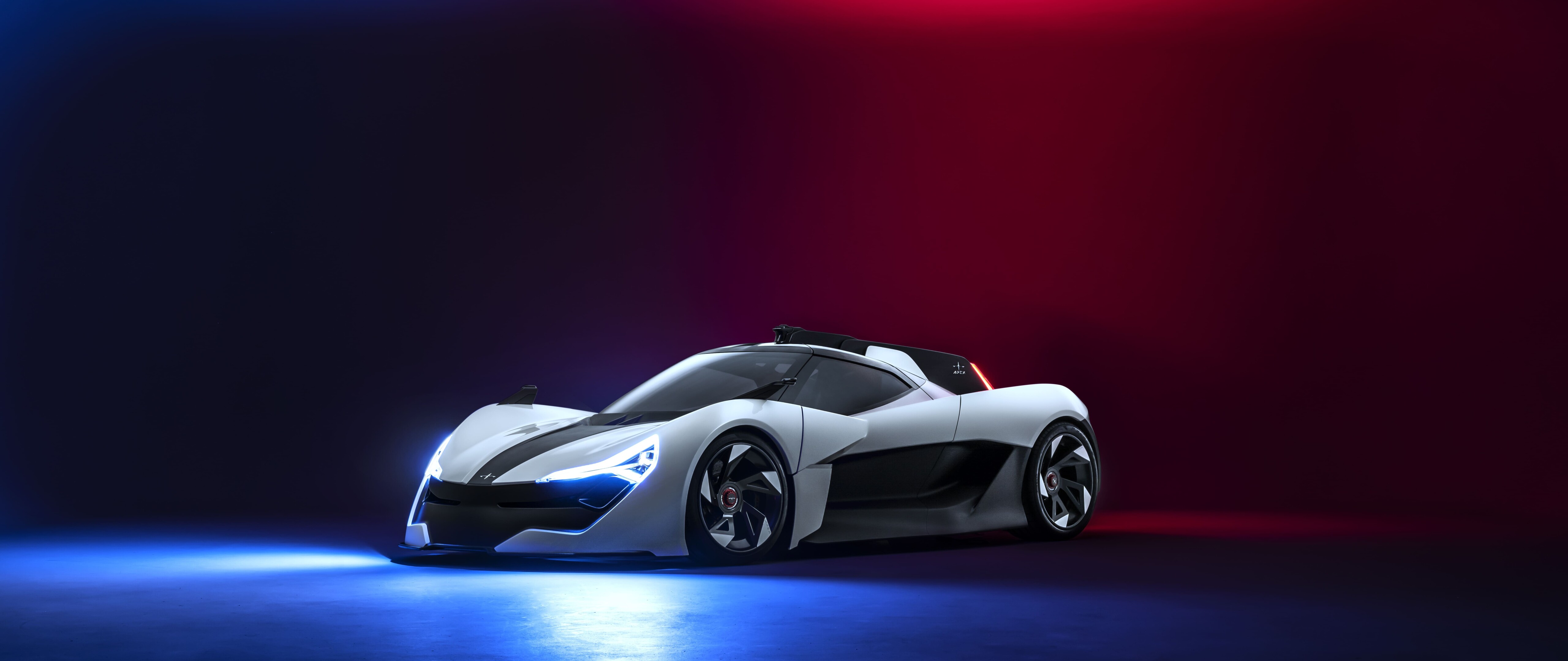 Une voiture de sport moderne, élégante et aérodynamique, présentée dans un studio professionnel.